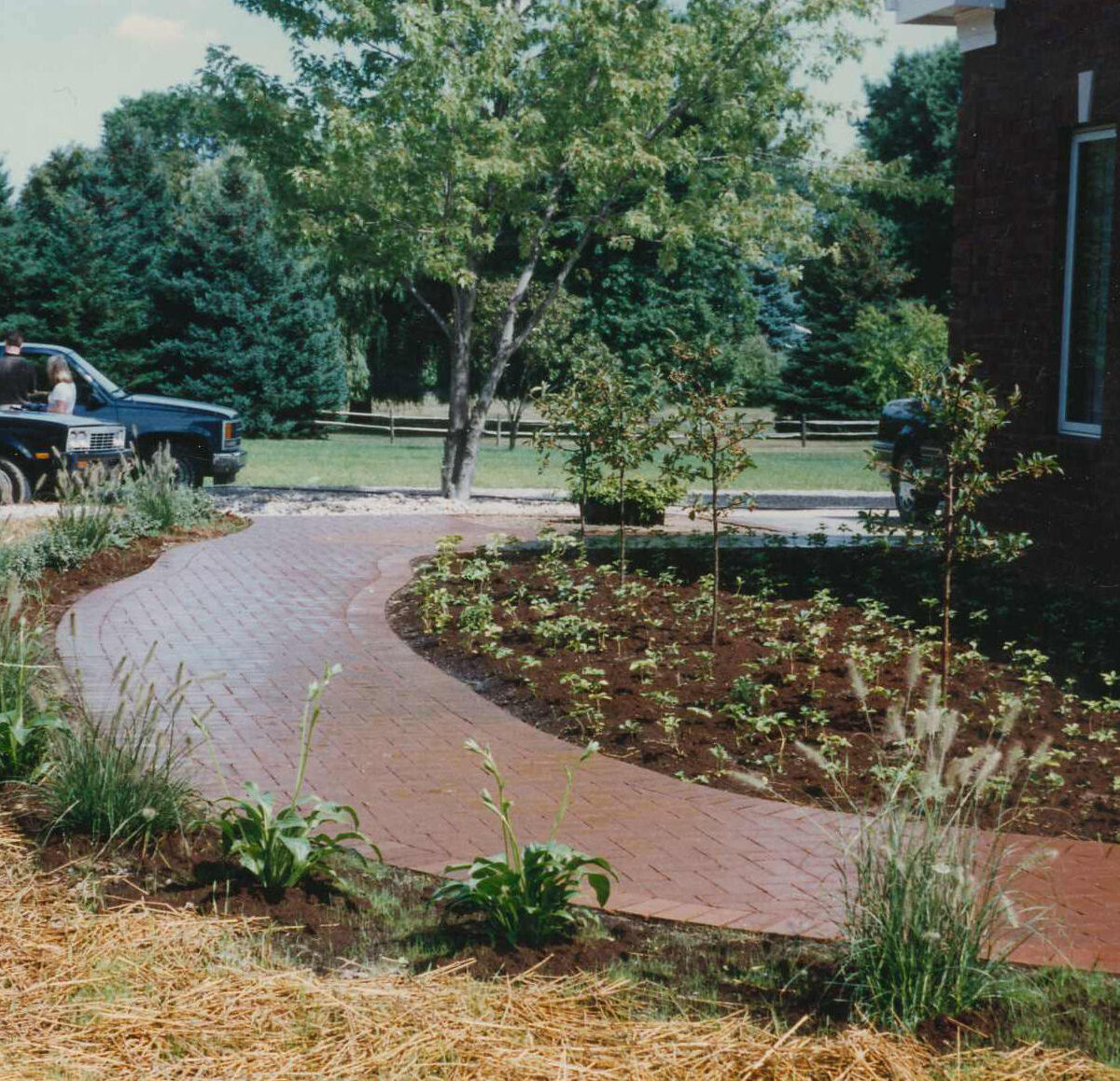 Brick path leading to the entrance of a home