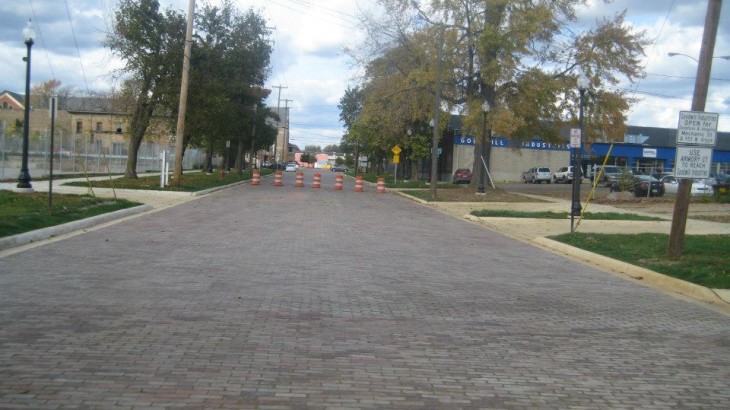 A brick road made by Brick Paver Construction leading into downtown