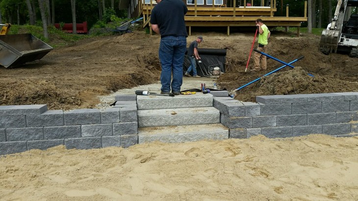 Brick Pavers laying the foundation of brick steps and brick path