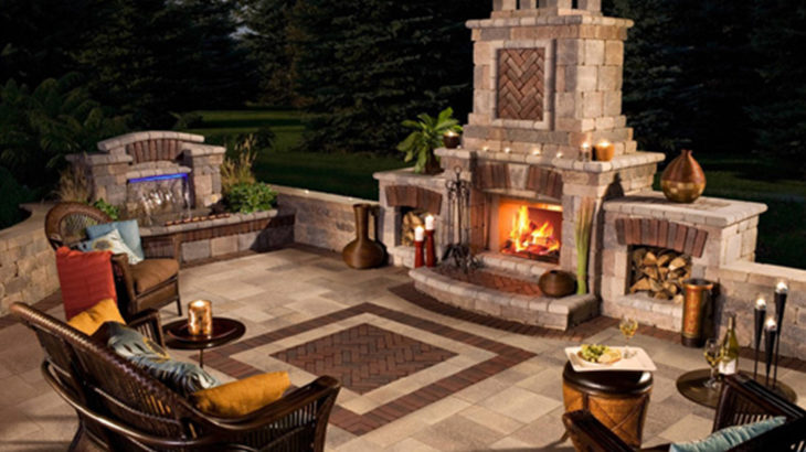 A wonderful outdoor brick paved fireplace set